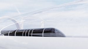 <p>Un train Hyperloop futuriste filant à grande vitesse dans un tube sous vide. </p>